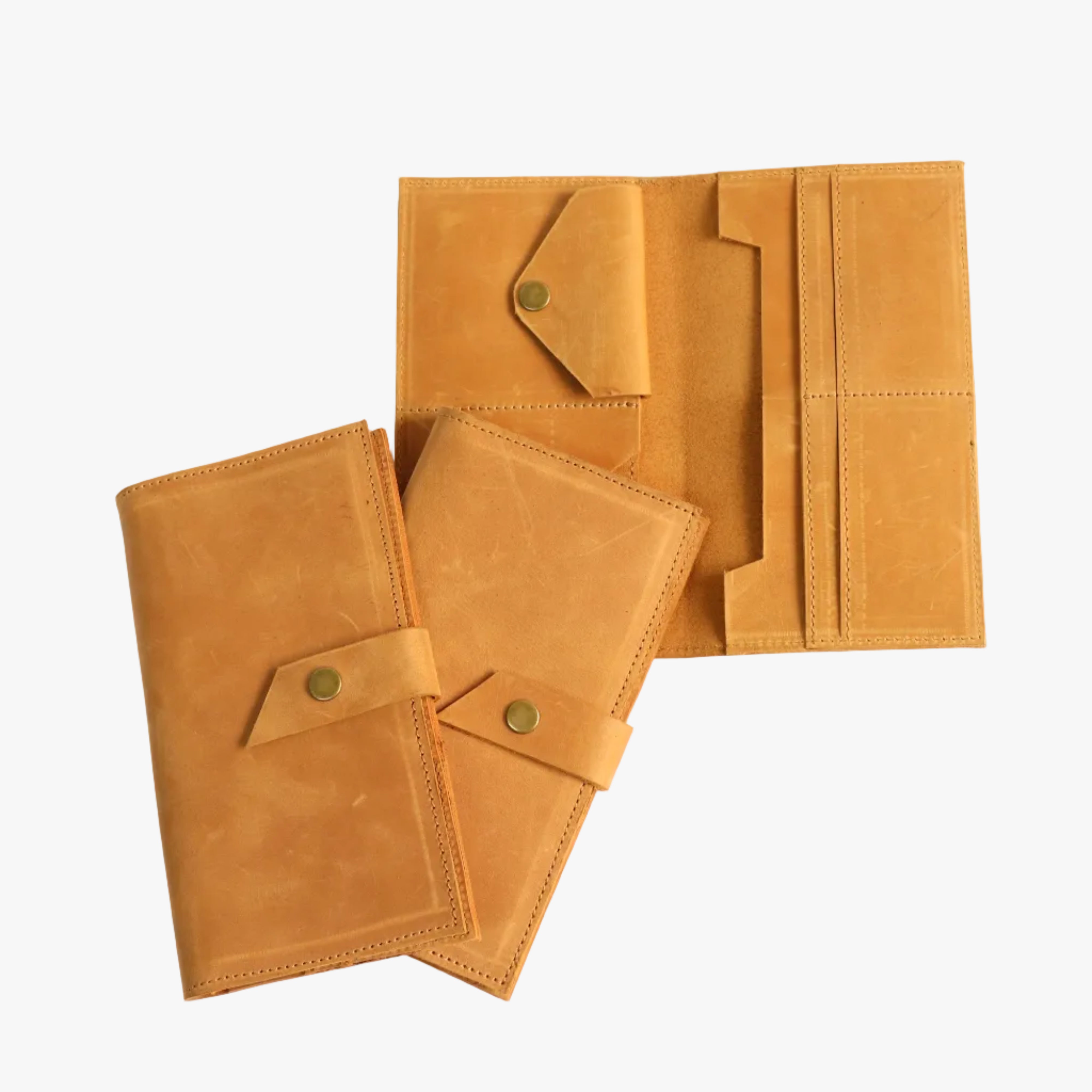 Two tan leather wallet or planner organizer cases with snap closures, shown on a plain white background. One case is open, revealing card slots and interior compartments, while the other is closed.
