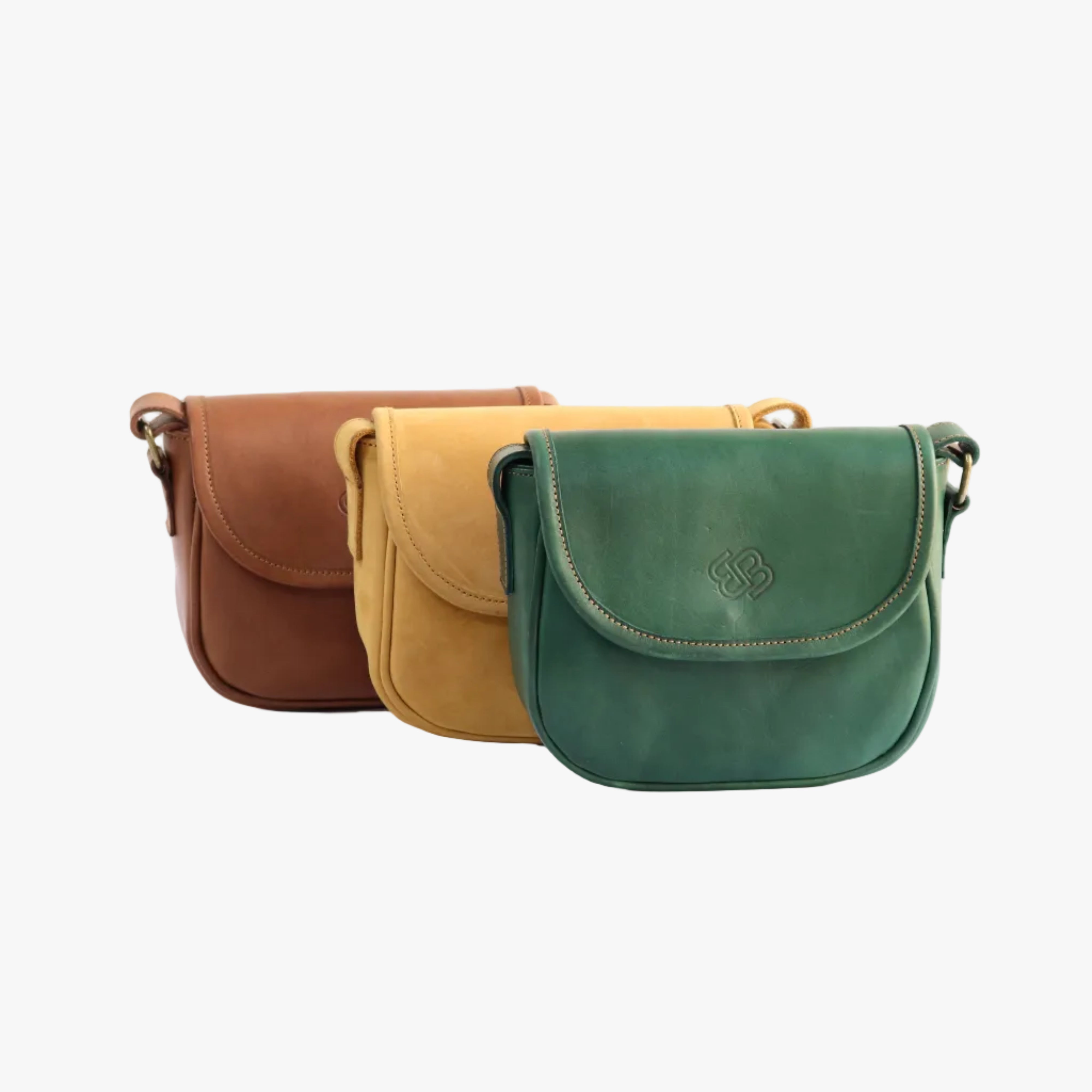 Three leather shoulder bags stacked vertically in green, tan, and brown, displayed against a plain white background.