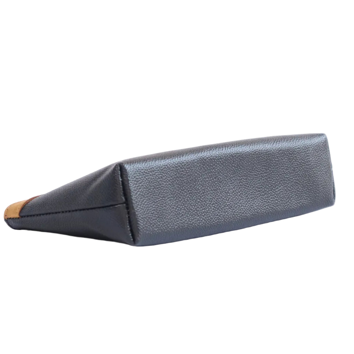 A dark gray textured leather clutch bag with a pointed triangular base and a small tan accent on the side, shown on a plain white background.