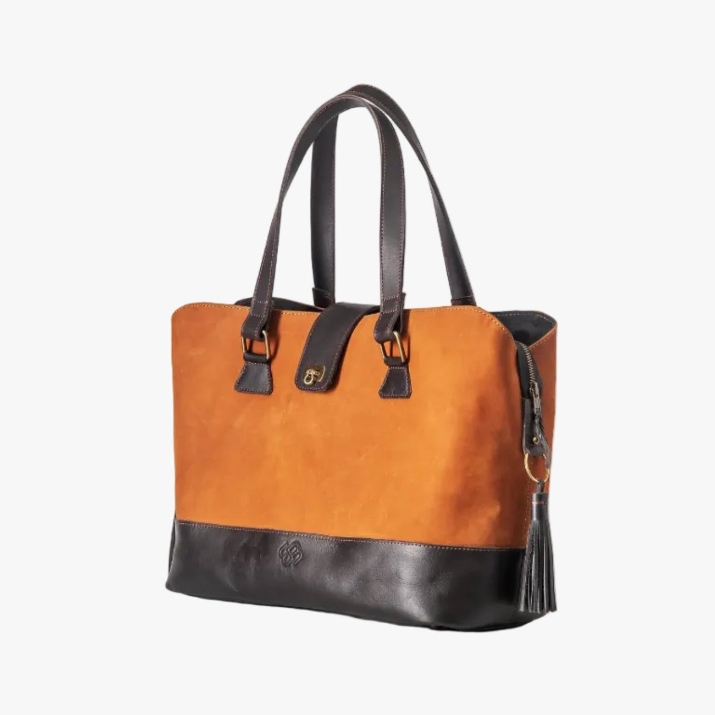 A color-blocked leather tote bag with a warm orange-brown suede upper body and black leather handles, trim, and base, shown on a clean white background.