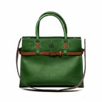 Blueberry Leather Duma forest green cowhide tote bag with brown buckle belt and top handles on white background.