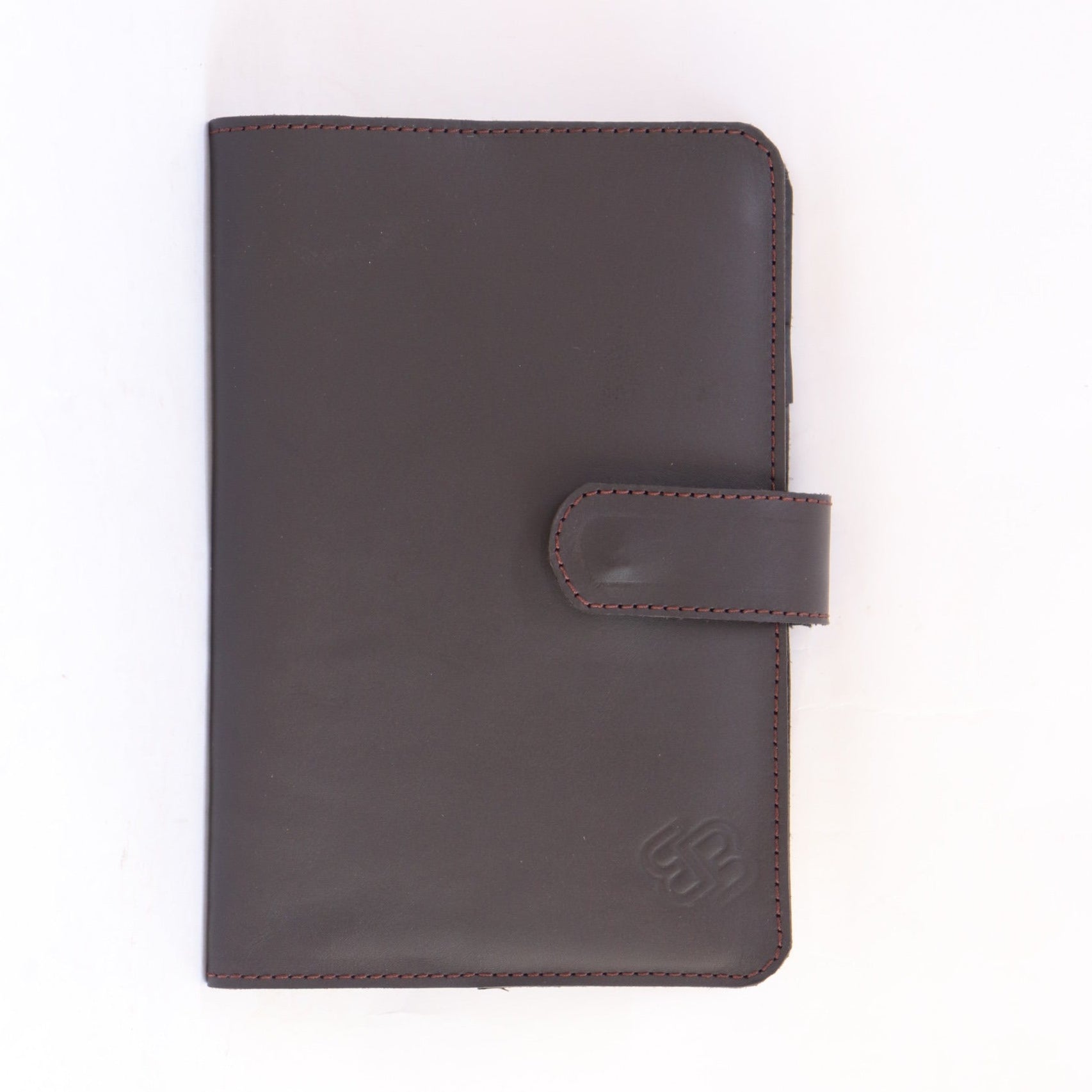 A dark brown leather wallet with a flap closure and a debossed logo on the upper right, photographed against a plain white background.